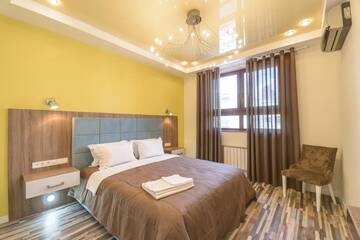 Современные дизайнерские апартаменты с 1 спальней и ванной в Апартаментах Partner Guest House Shota Rustaveli